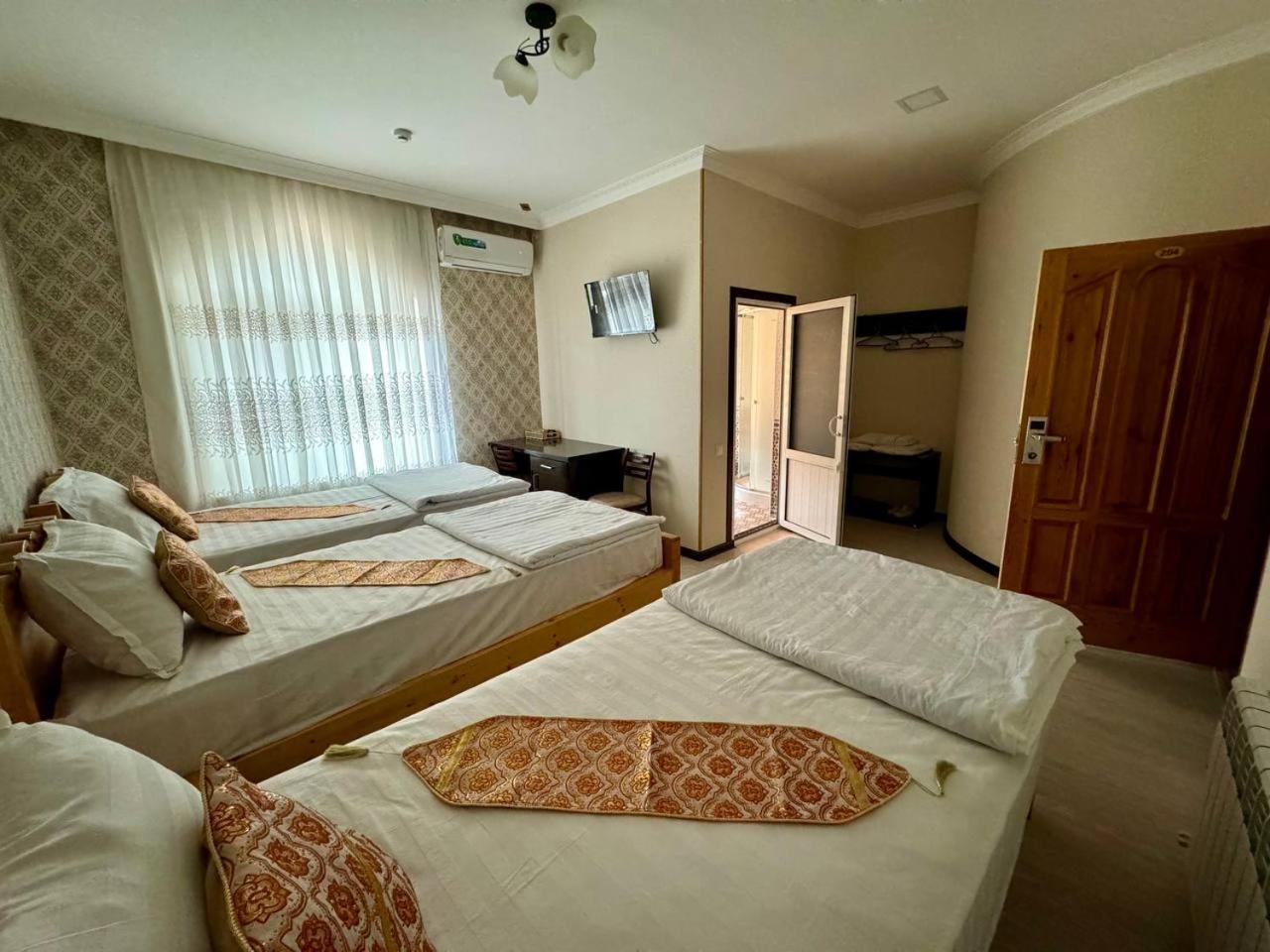Qamar Hotel بخارى المظهر الخارجي الصورة